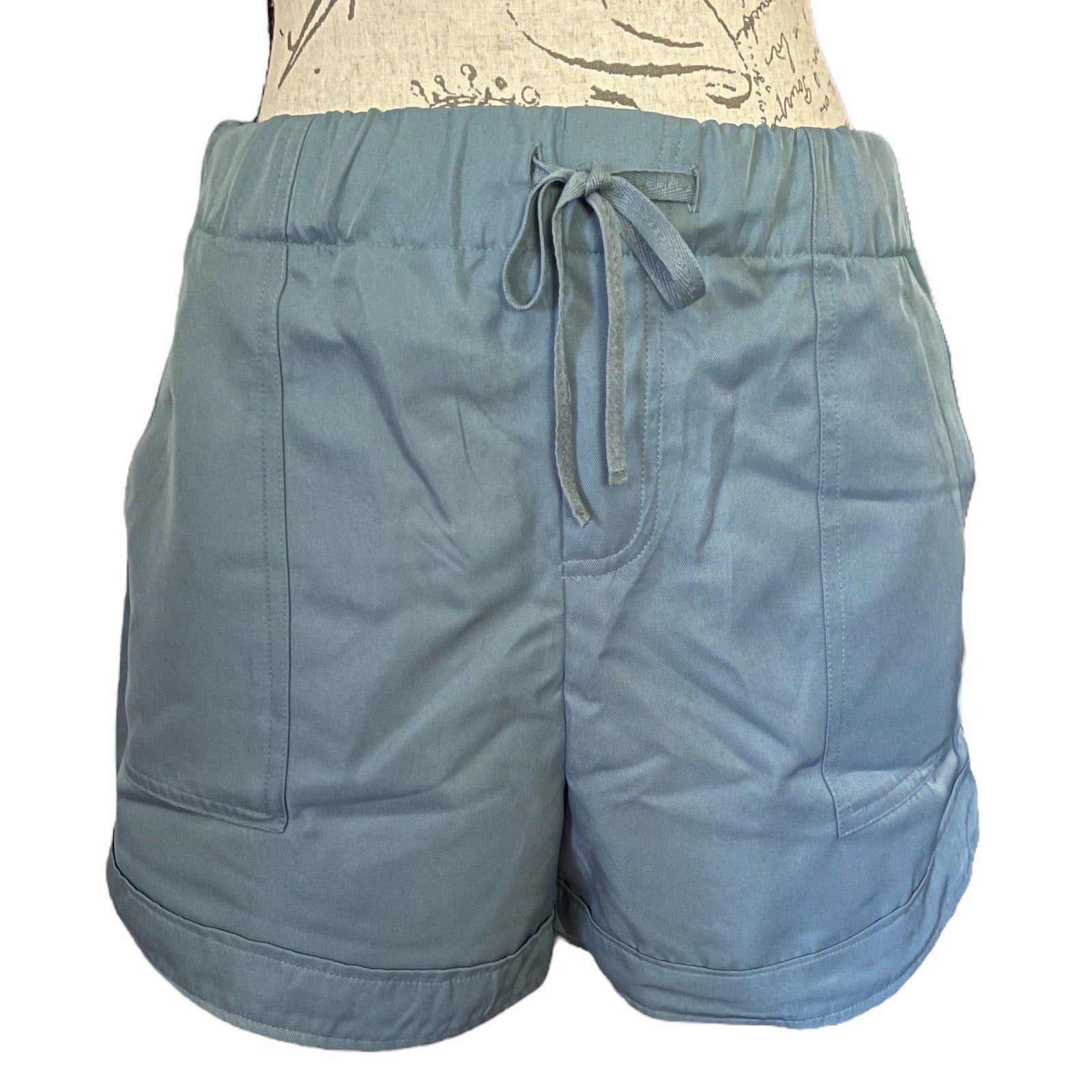Front of Blue Gray shorts with a drawstring on a white background