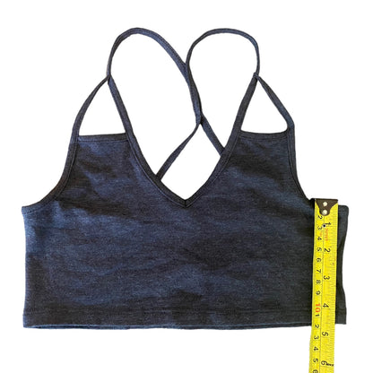 Gray tank top with a measuring tape on a white background