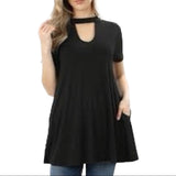 Front of black tunic on model