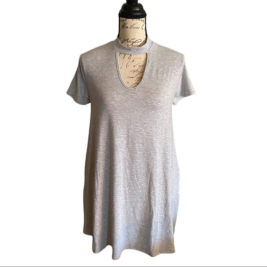 Gray tunic front on a mannequin against a white background