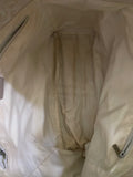 Interior of Chanel purse with dirt and marks