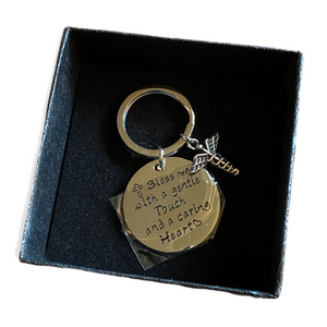 Silver nursing keychain in box