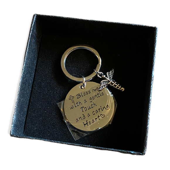 Silver nursing keychain in box